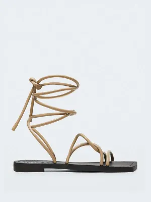 Beige strappy flat sandals