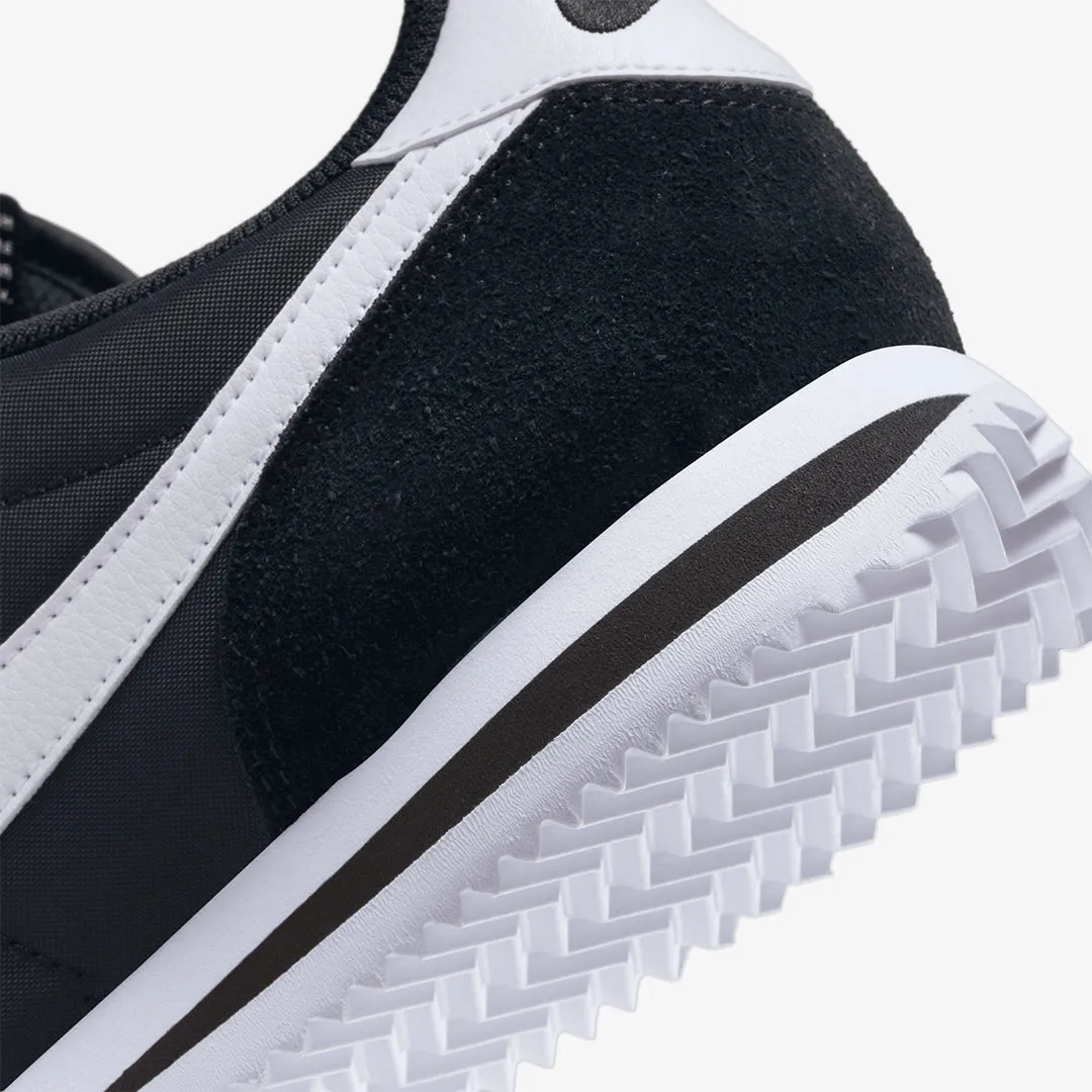 Nike | WMN'S CORTEZ TXT  { BLACK/WHITE