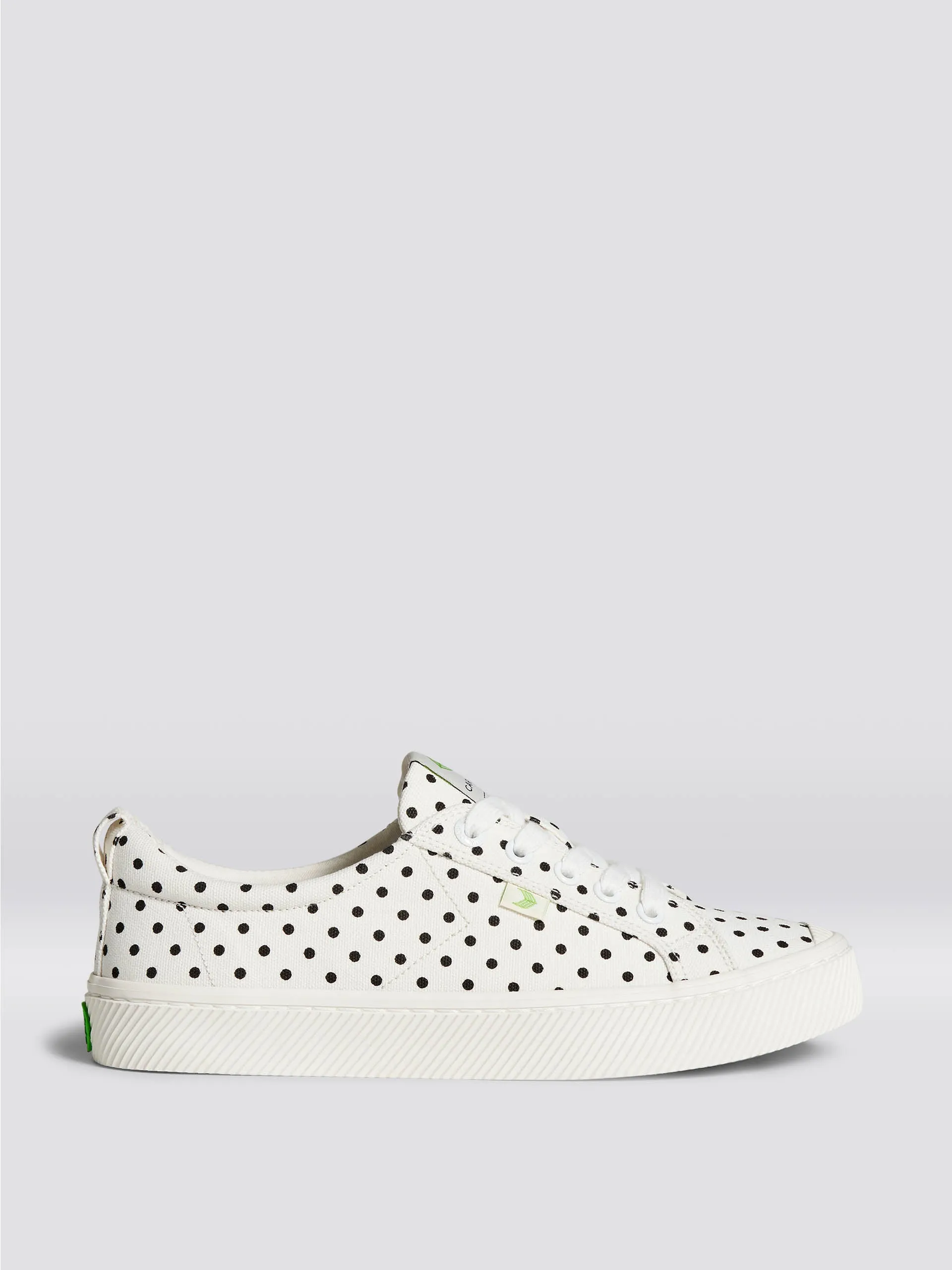 Oca Low white polka dot canvas trainers